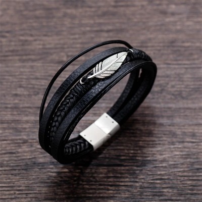 Bratara din piele neagra cu frunza argintie cu inchizatoare magnetica Bratara din piele neagra cu frunza argintie cu inchizatoare magnetica